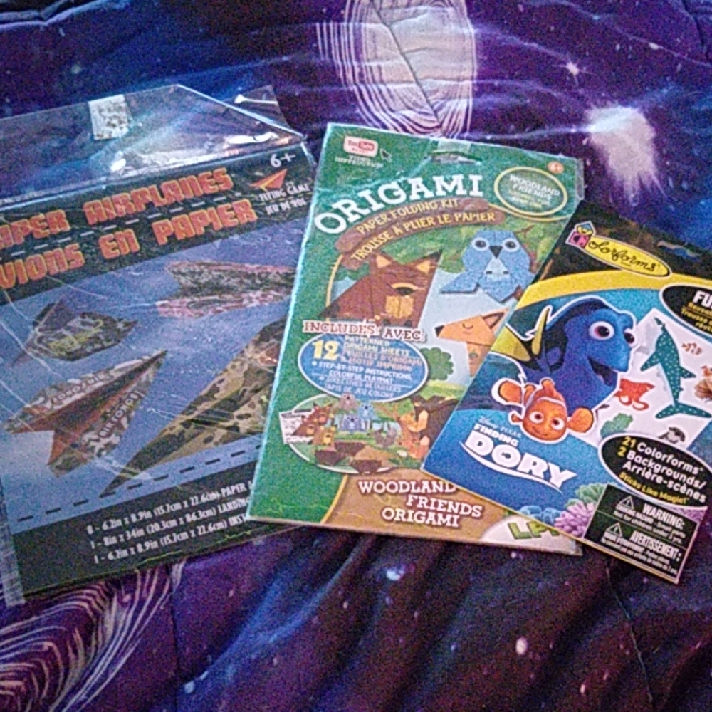 Origami kit, finding dory stickers, & airplane gam